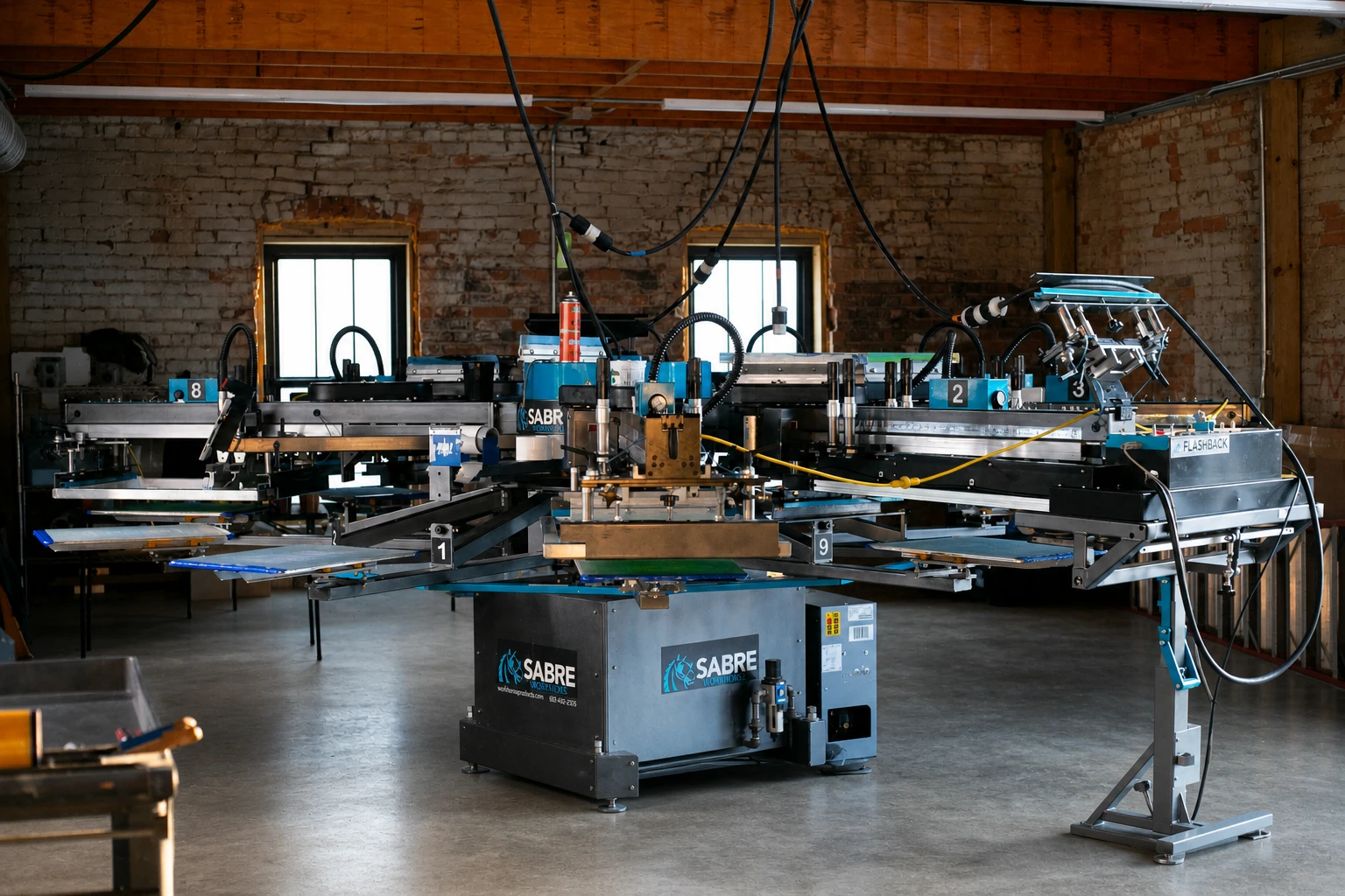 Production floor with automatic screen printing equipment