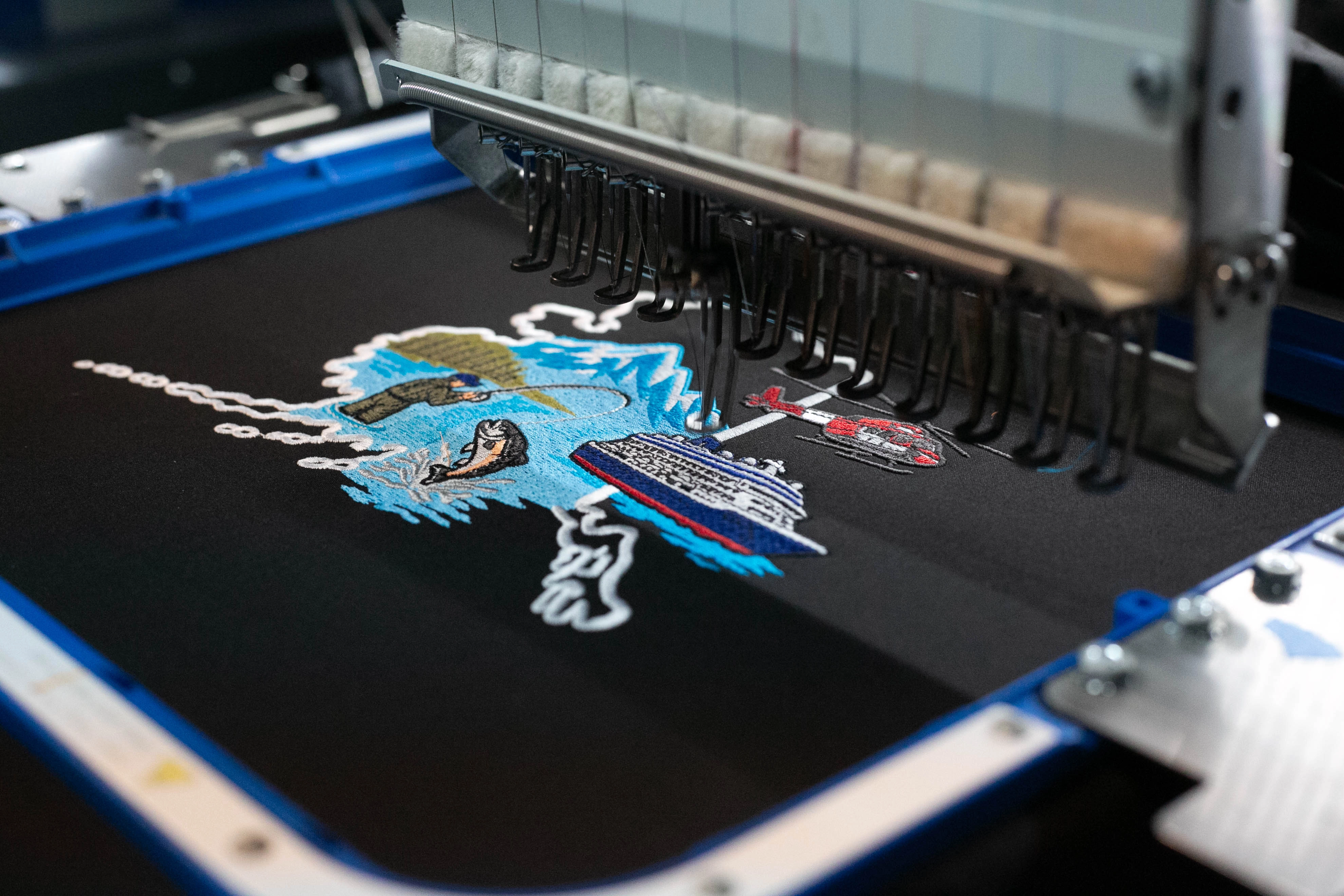 Close-up of a large embroidered logo