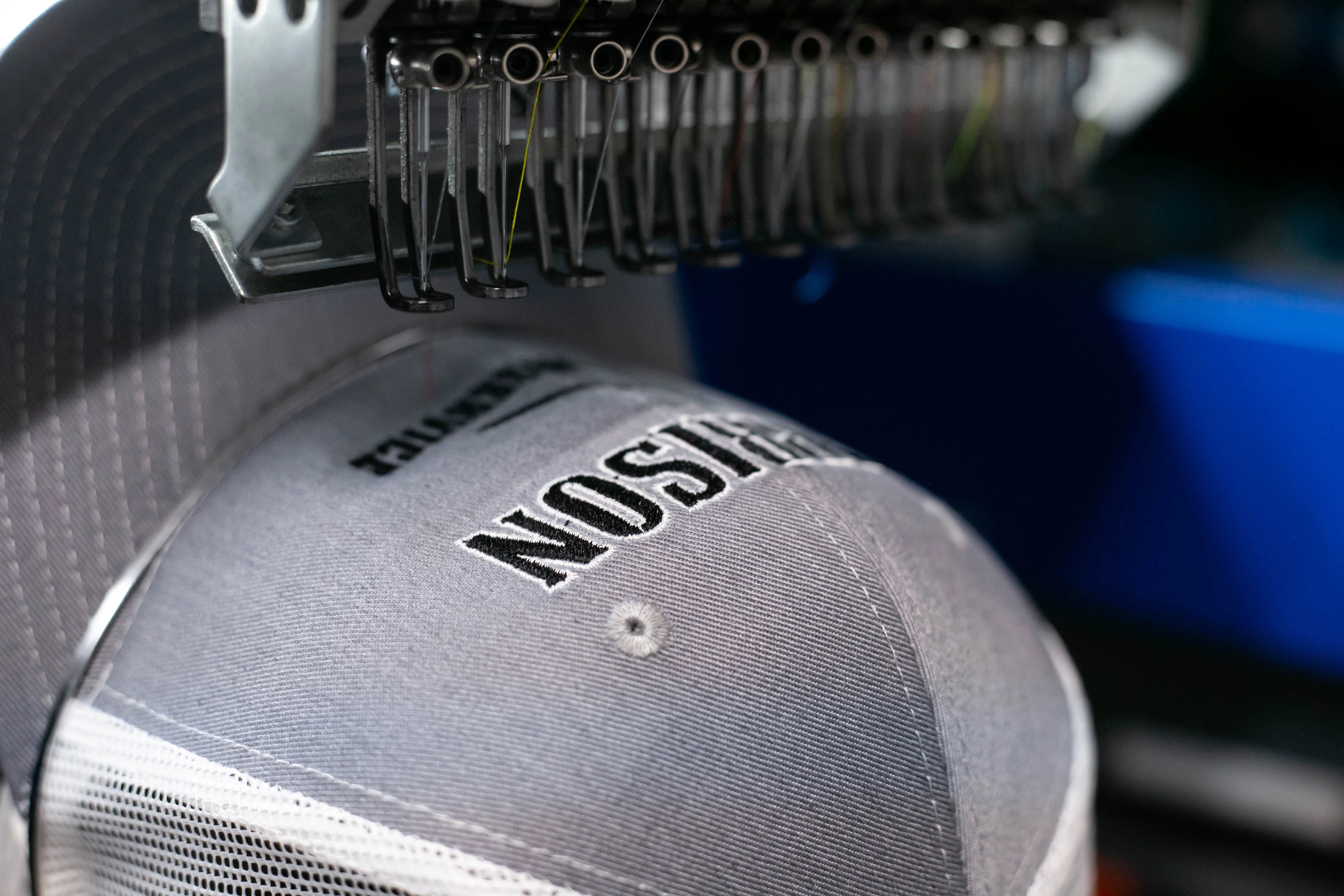 Row of commercial embroidery machines