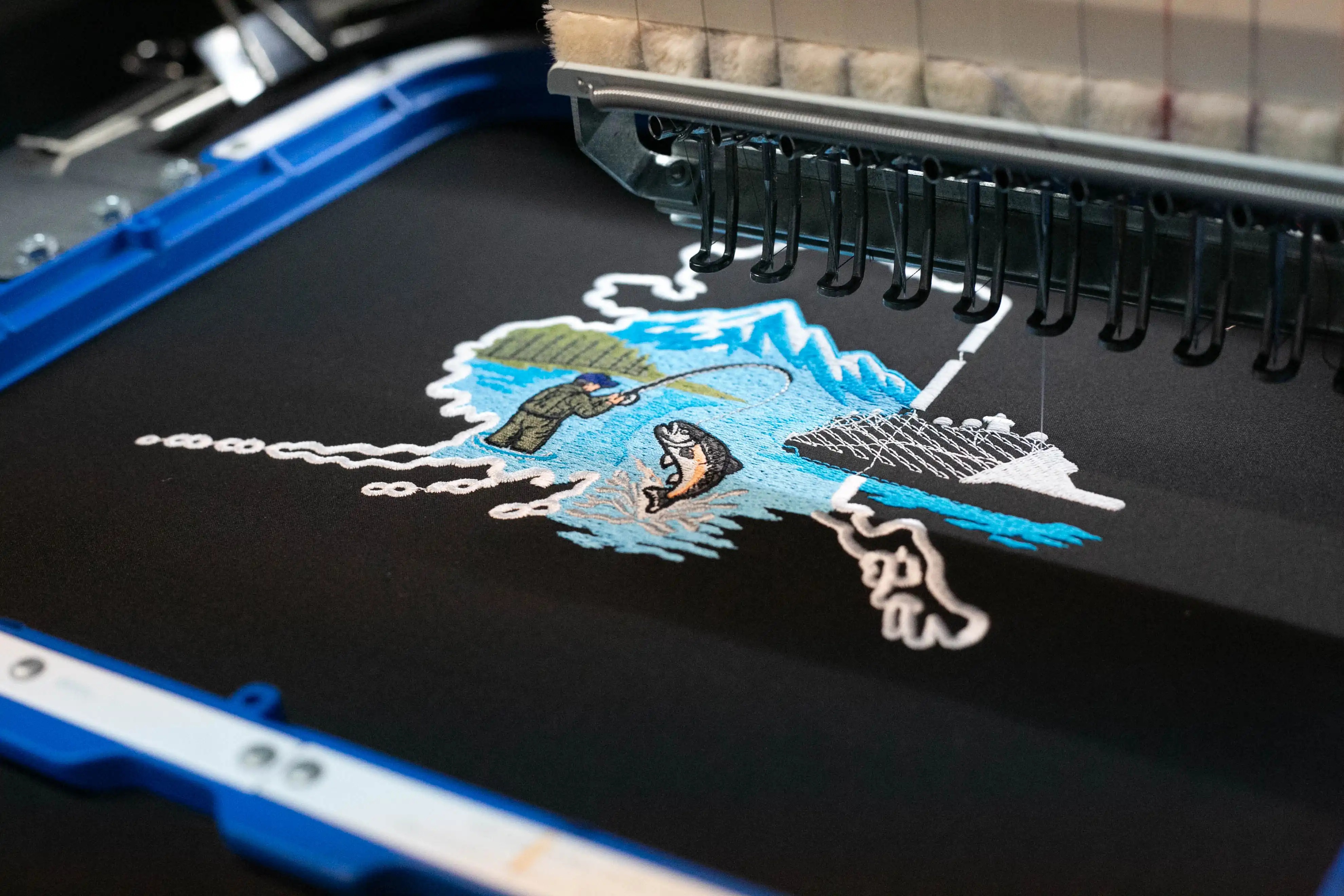 Finished embroidered apparel on display
